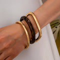Wall to Wall by Josslyn Tort & Gold Bangle Trio Bangle Set