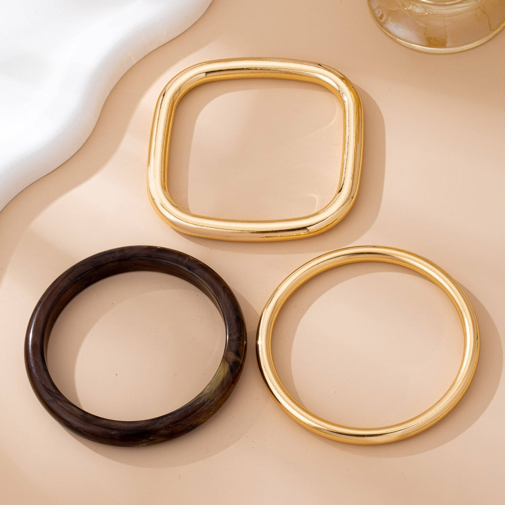 Wall to Wall by Josslyn Tort & Gold Bangle Trio Bangle Set